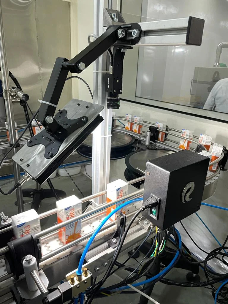 Kiara Sorting and Inspecting packaged drinks for absence and presence of expiry date on the tetrapack with the use of Machine Learning and artificial intelligence